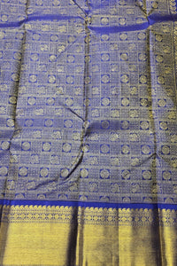 Blue and yellow fabric with intricate patterns