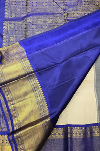 Blue and gold traditional fabric with intricate patterns