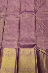 Purple and green fabric with intricate patterns