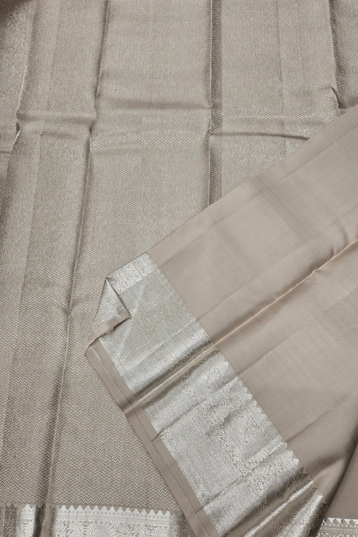 Beige Kanchipuram Silk Saree with Silver Border