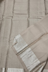 Beige Kanchipuram Silk Saree with Silver Border