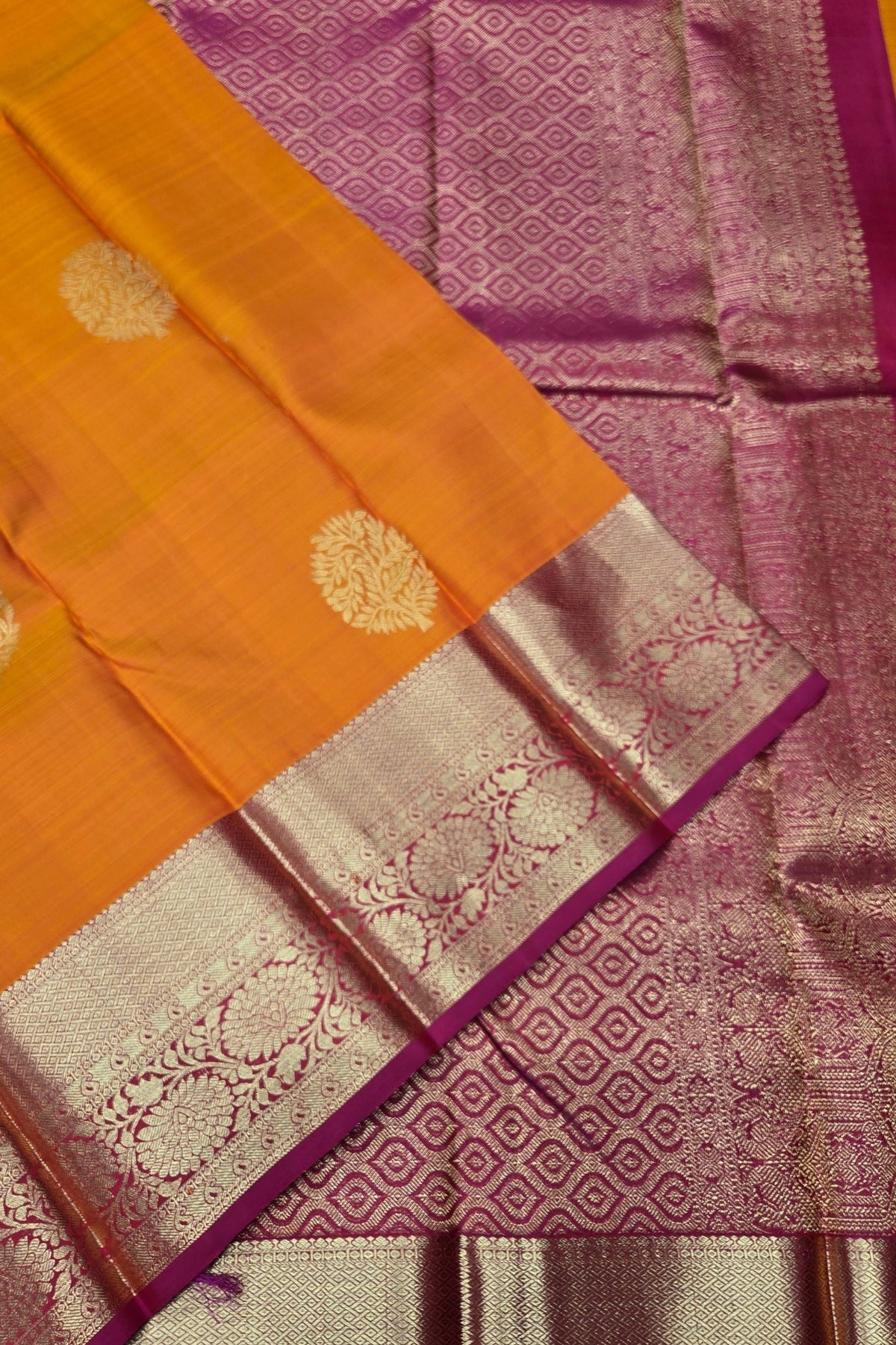 Saree with orange, pink, and gray patterns