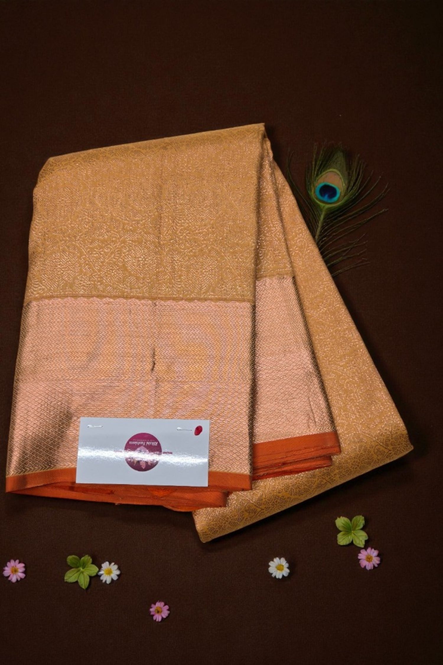Folded fabric with a brand label on a brown background