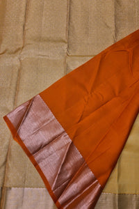 Beige Kanchipuram Silk Saree with Orange Pallu