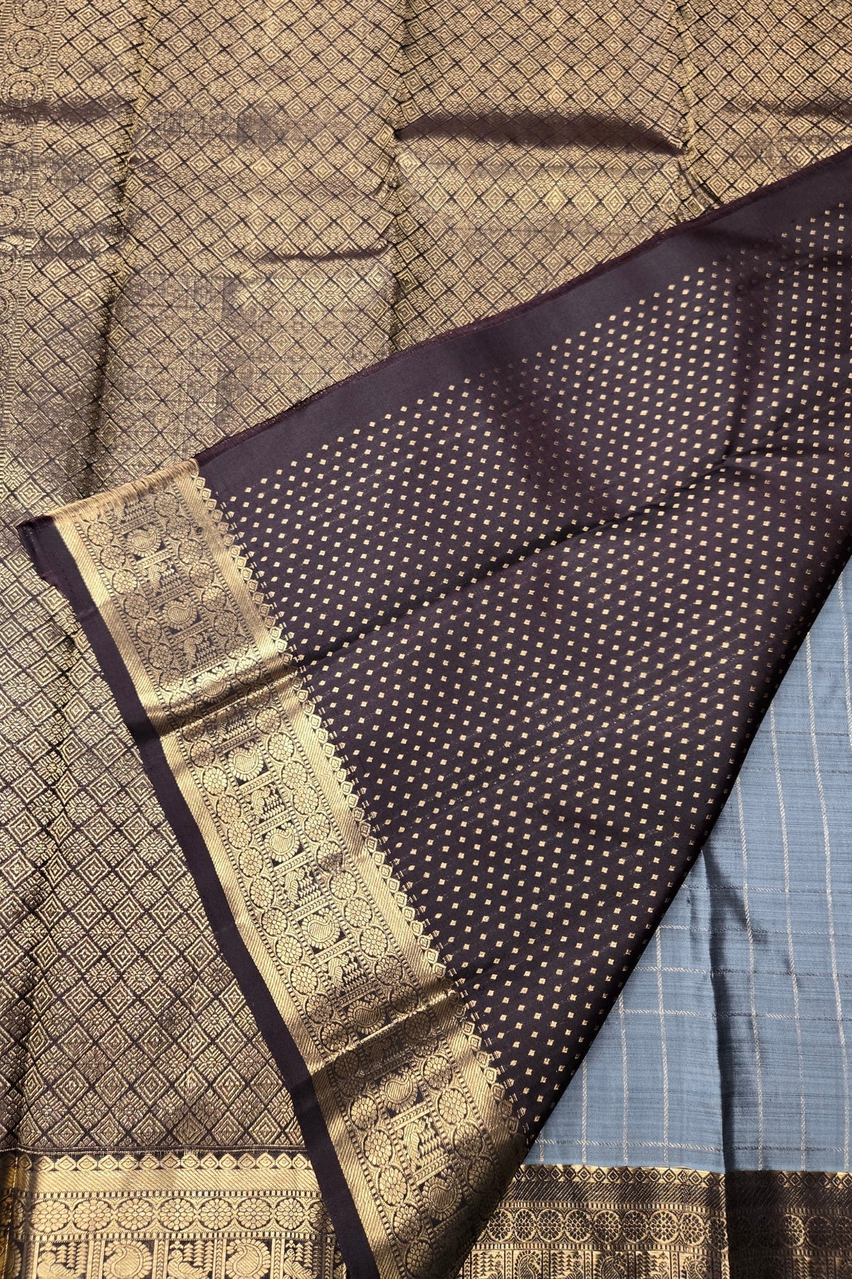 Sari with intricate patterns and a border