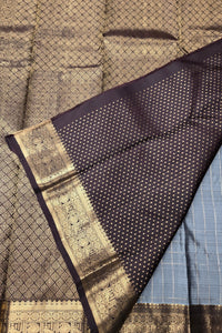 Sari with intricate patterns and a border