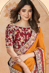 Orange Georgette Silk Embroidered Saree