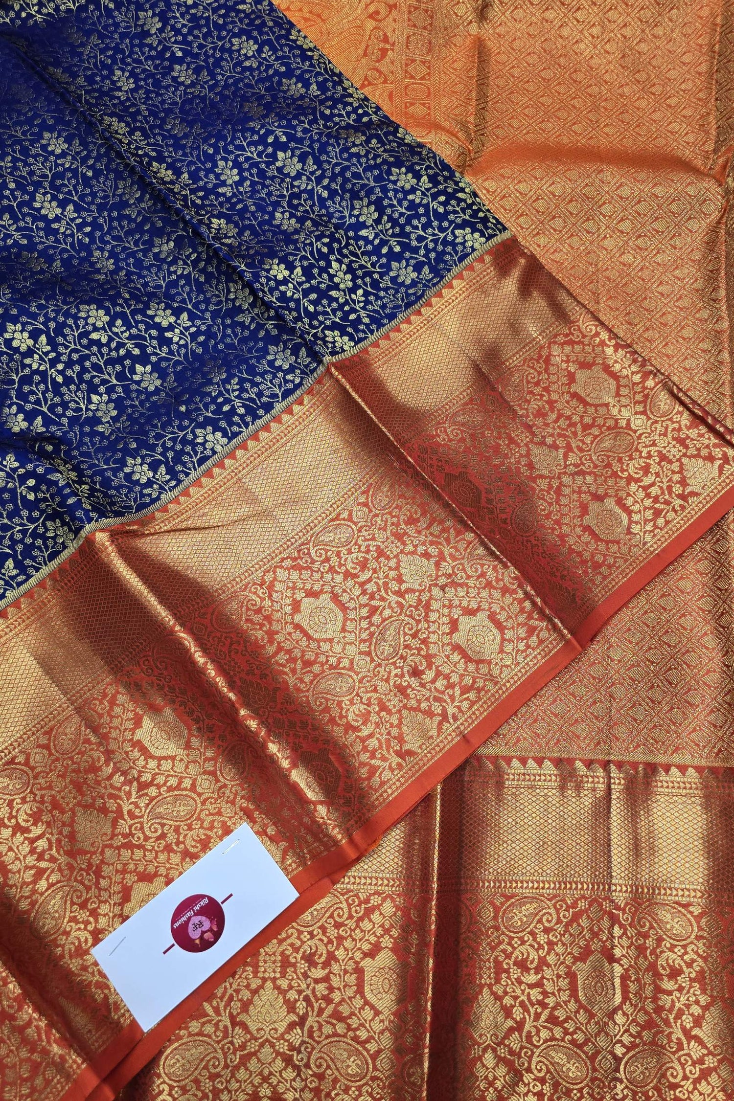Royal Blue and Orange Kanchipuram Silk Saree with Radiant Zari Work