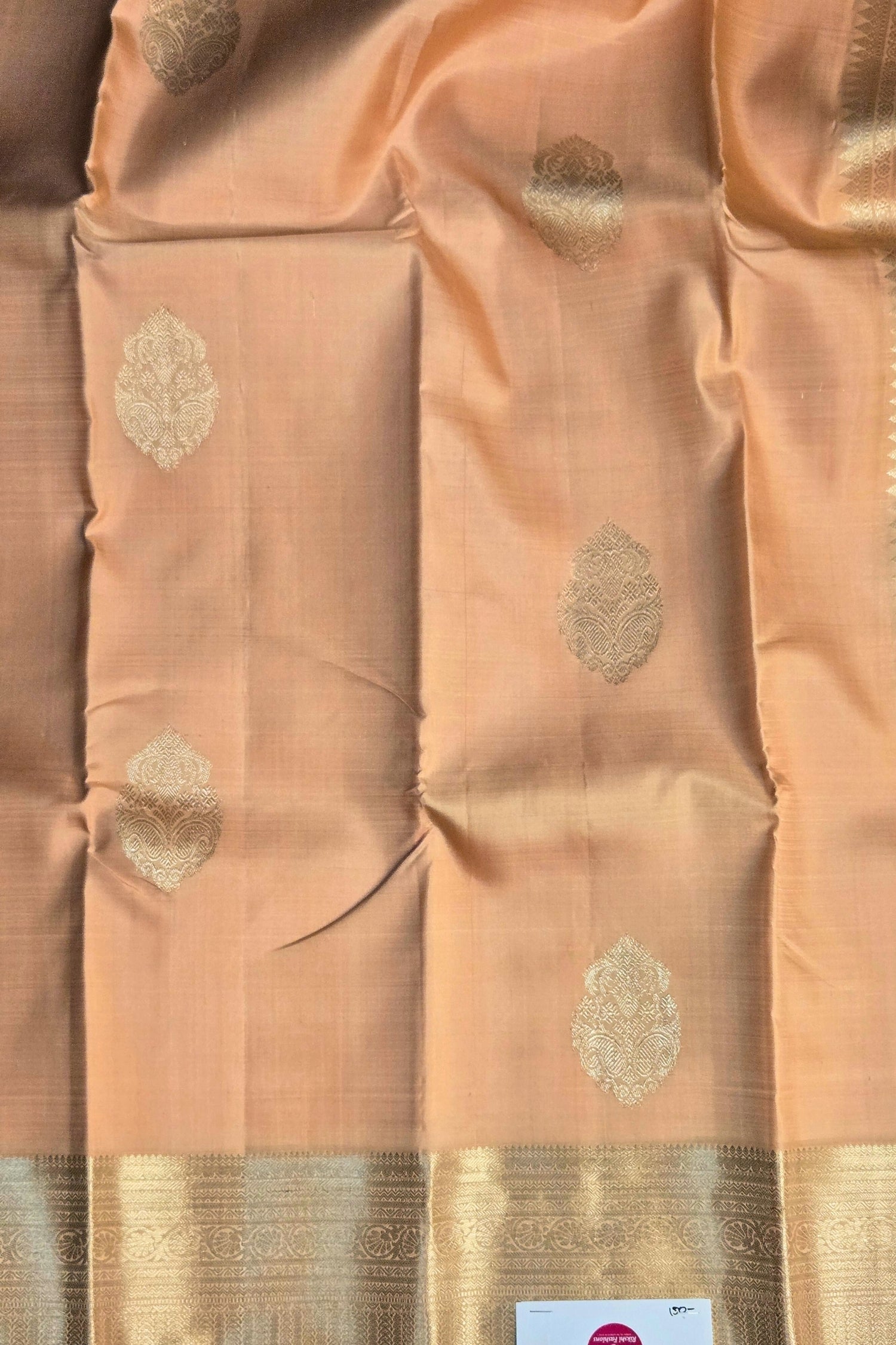 Bridal Pale Orange Kanchipuram Saree Draped Look