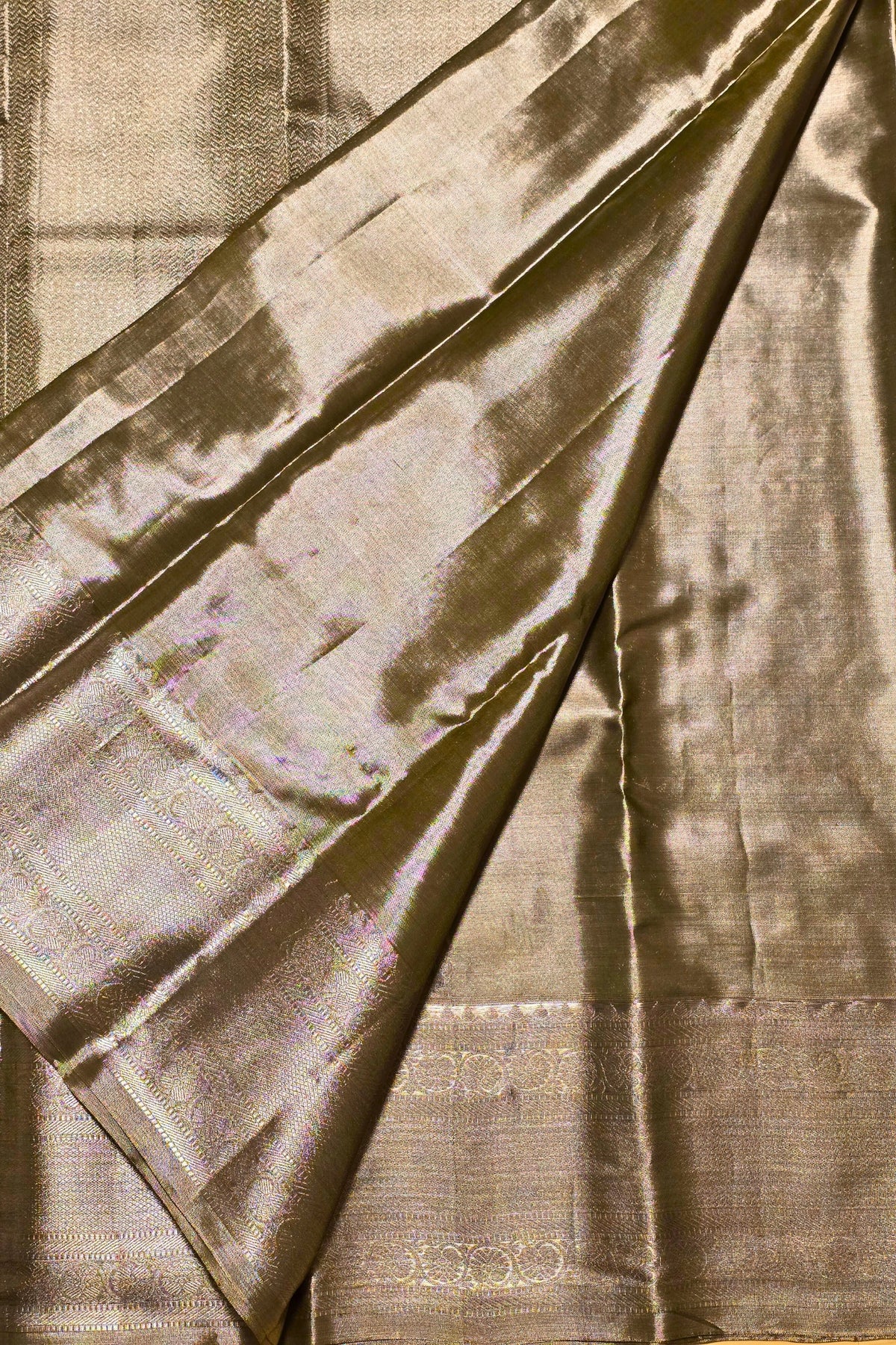 Close-up of brown fabric with a subtle pattern