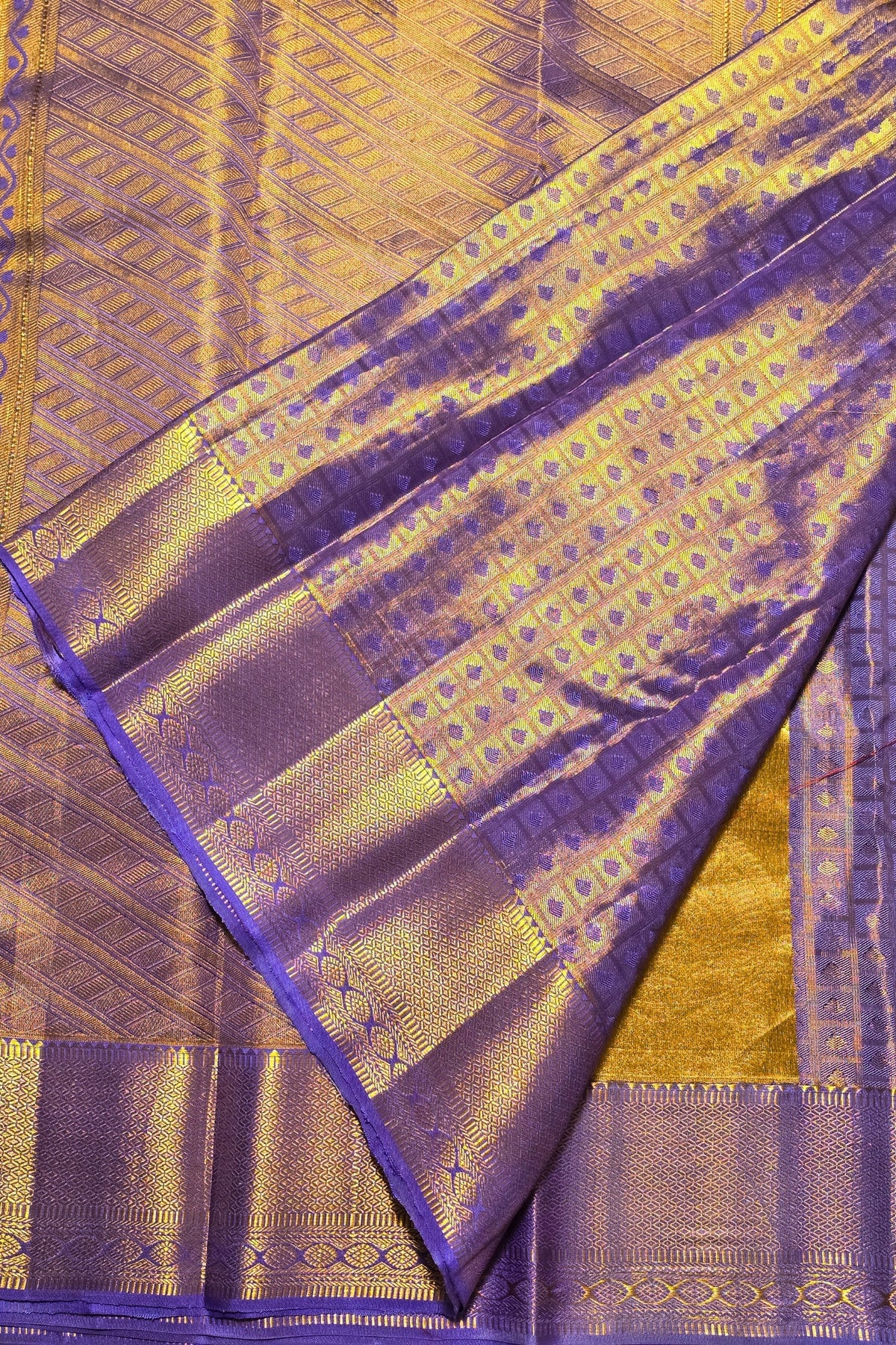Purple and gold fabric with intricate patterns