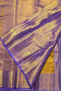 Purple and gold fabric with intricate patterns