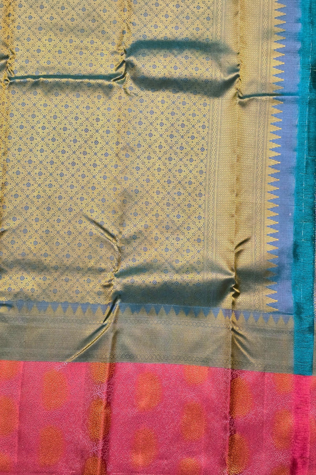 Sari with a patterned border and pink and red checkered fabric