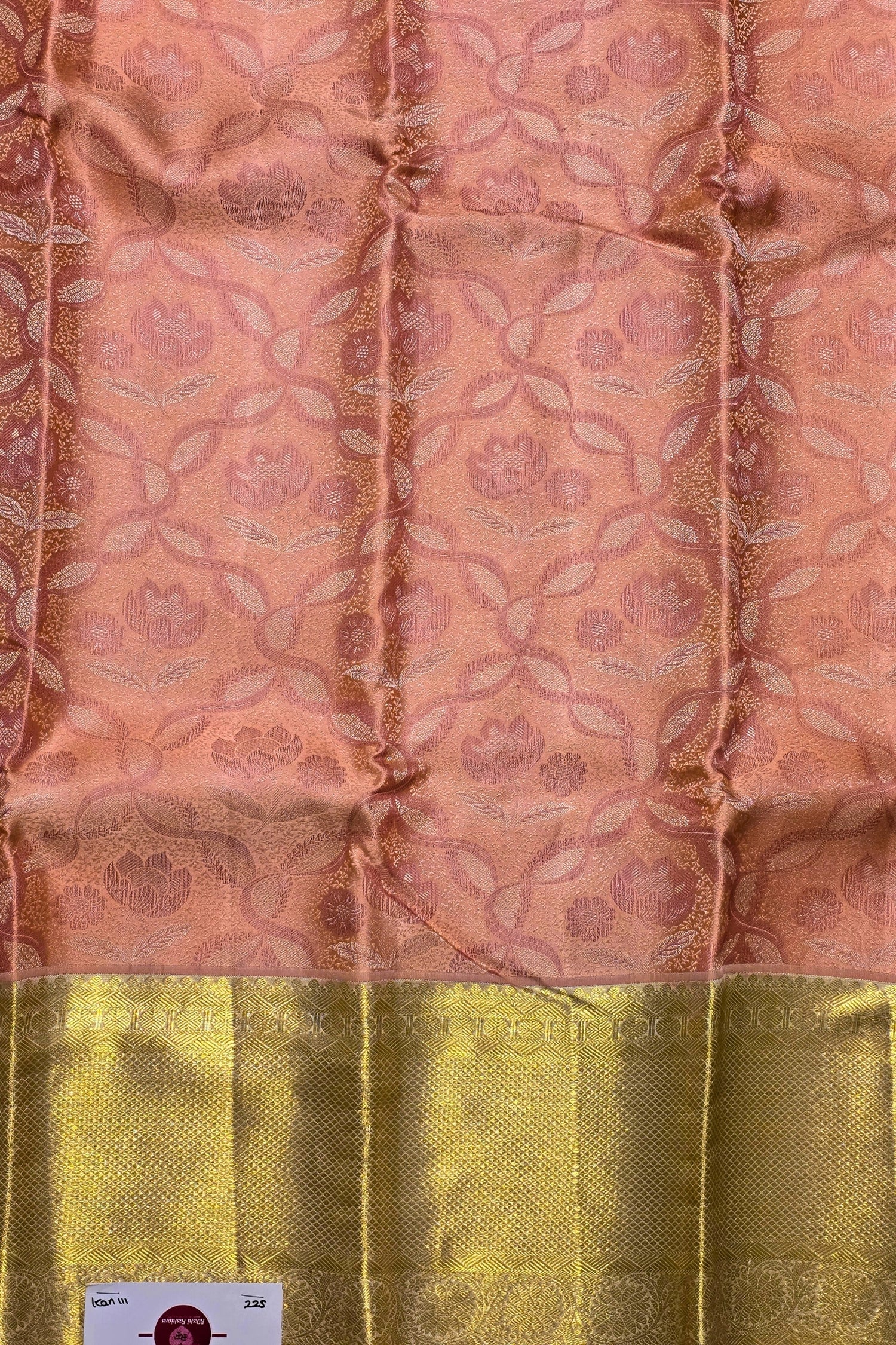 Fabric with pink and green patterned design