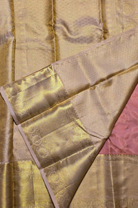 Close-up of gold fabric with a textured pattern