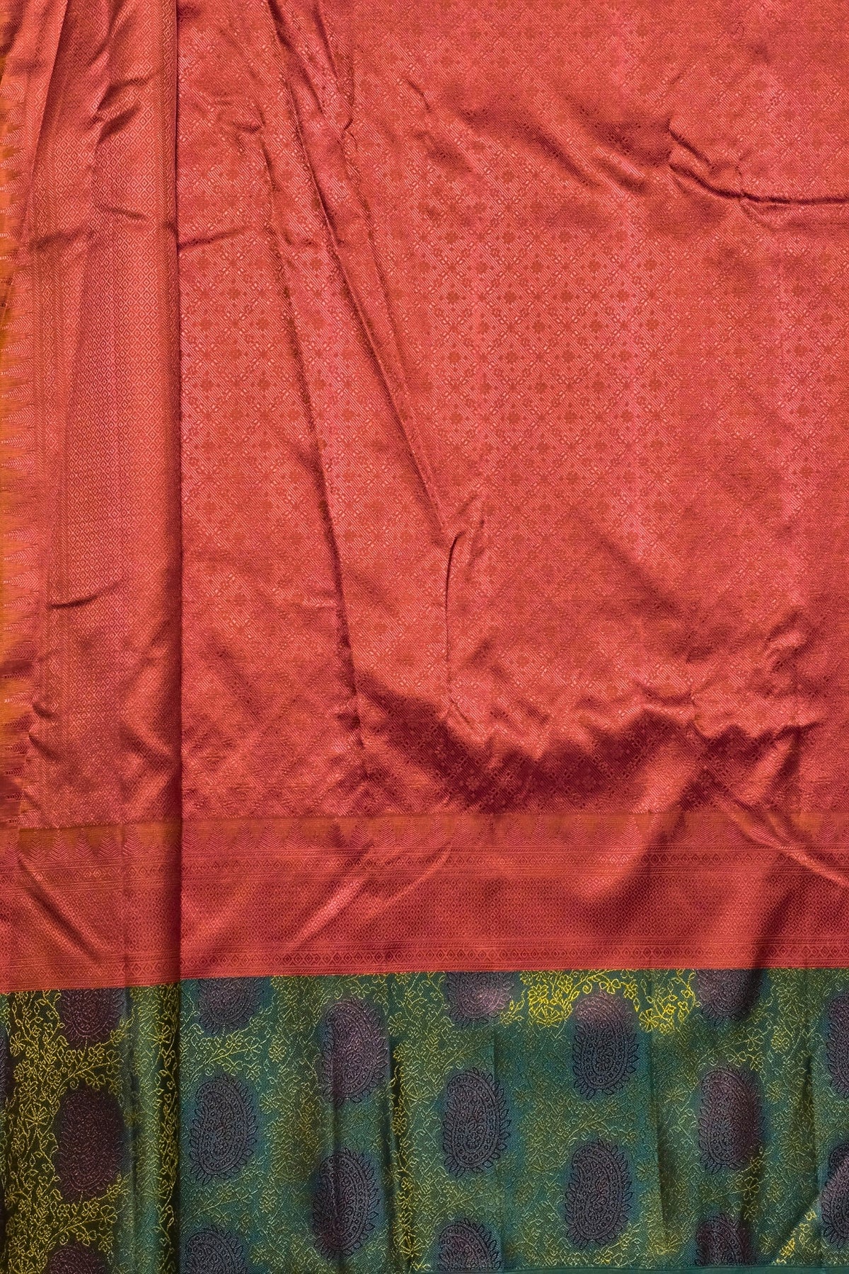 Red fabric with a patterned border