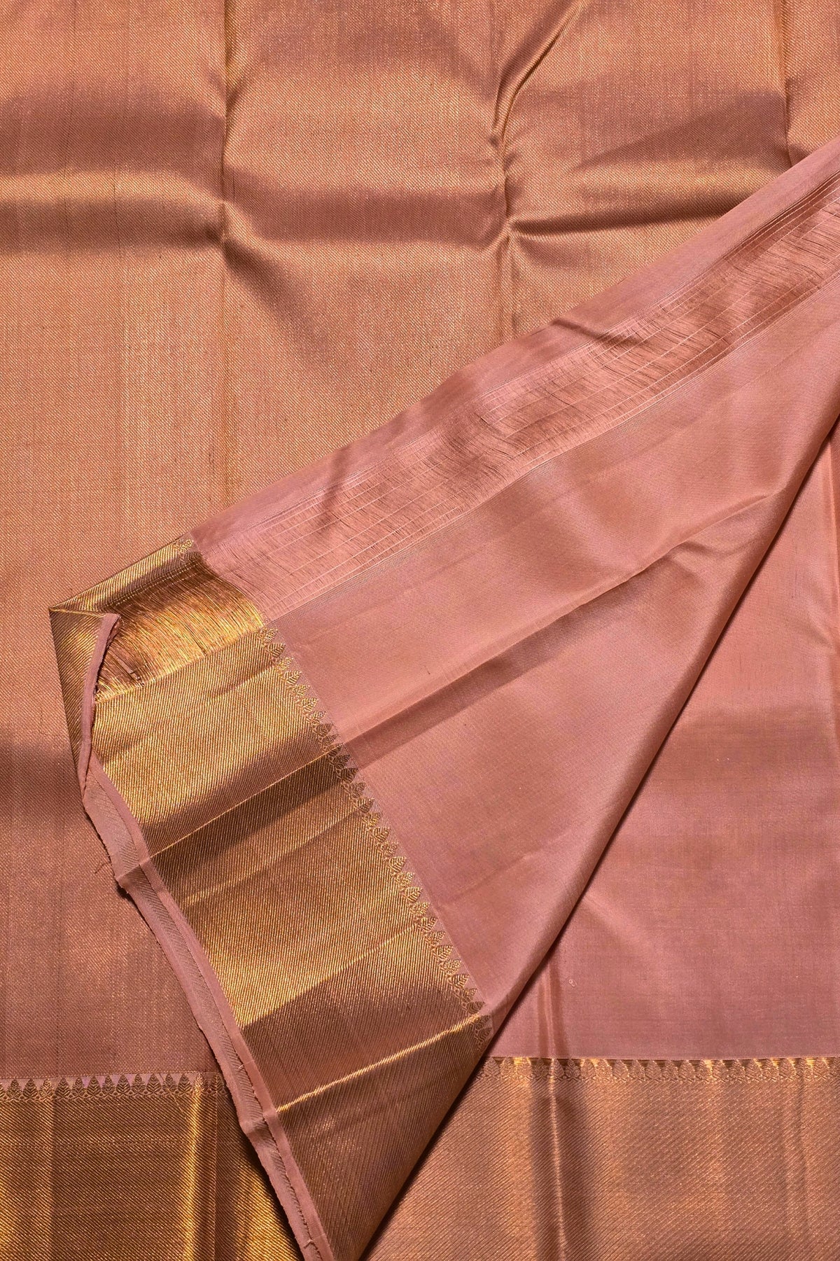 Brown saree with a gold border