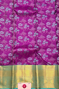 Purple saree with floral pattern and yellow border