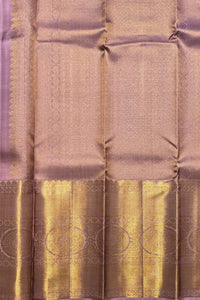 Silk saree with a gold border and intricate patterns