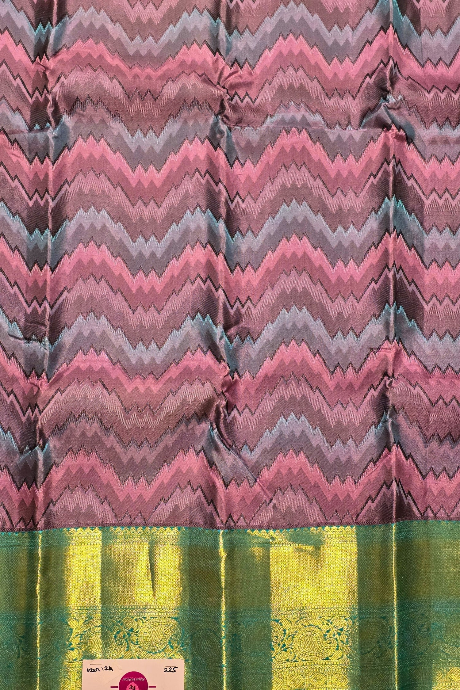 Silk saree with a pink and green pattern