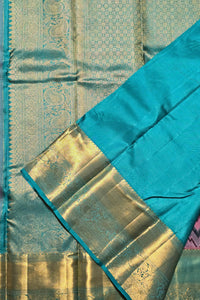 Close-up of a blue fabric with gold border