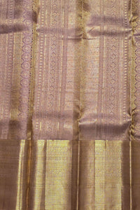 Close-up of patterned fabric with vertical stripes and textured design.