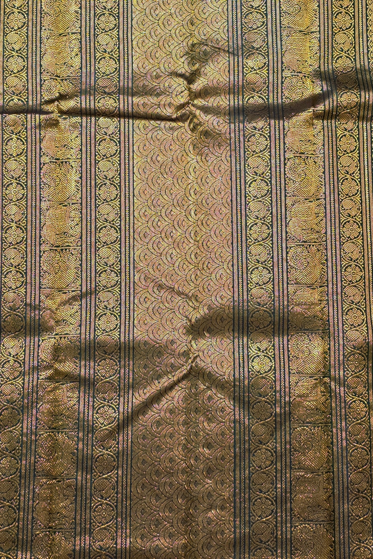 Textured fabric with intricate patterns and colors