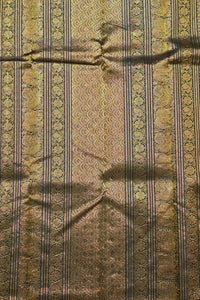 Textured fabric with intricate patterns and colors