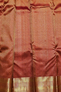 Close-up of brown fabric with a subtle pattern