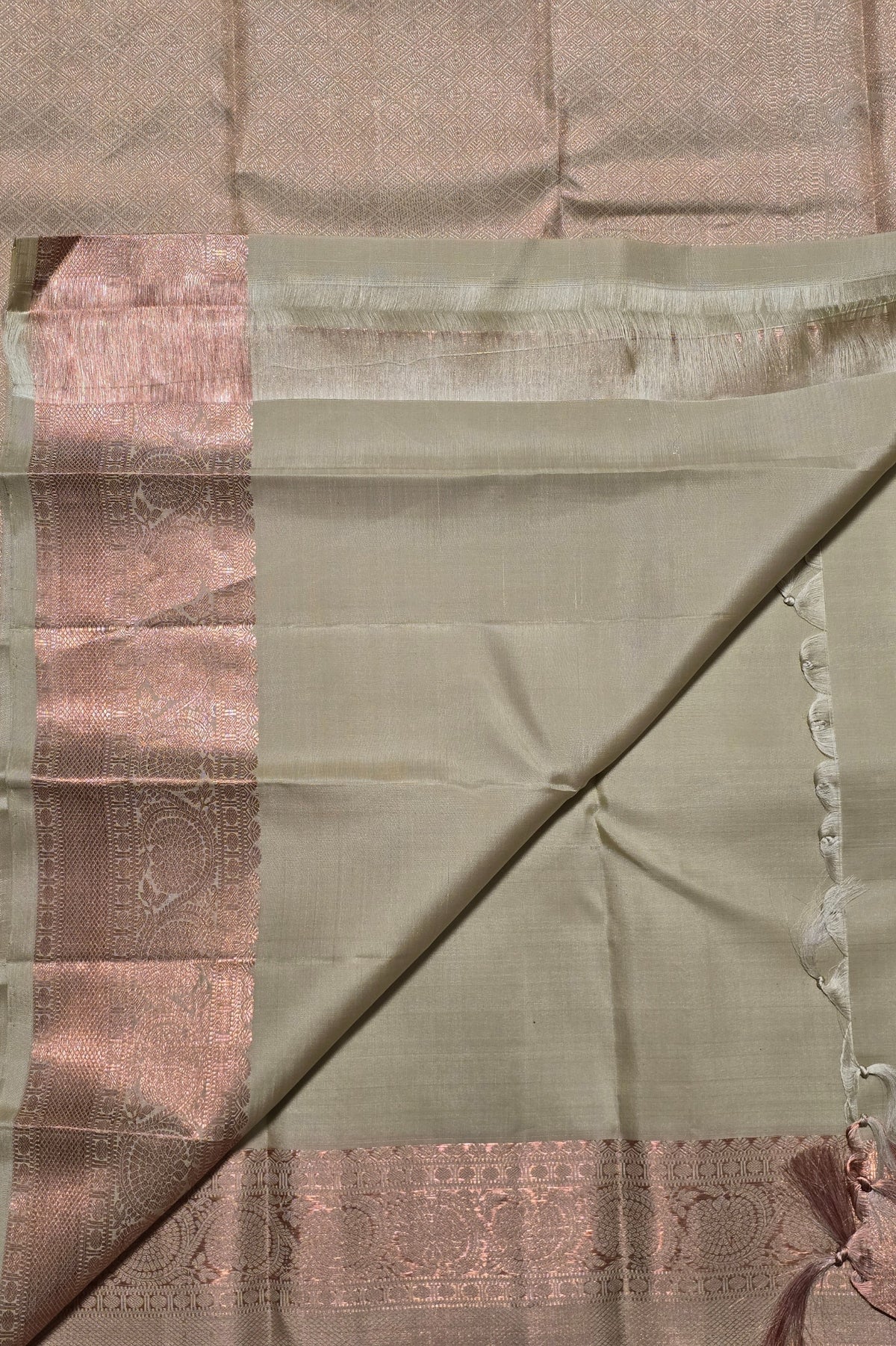 Brown and green fabric with a subtle pattern