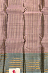 Fabric with a checkered pattern and a brand label in the corner
