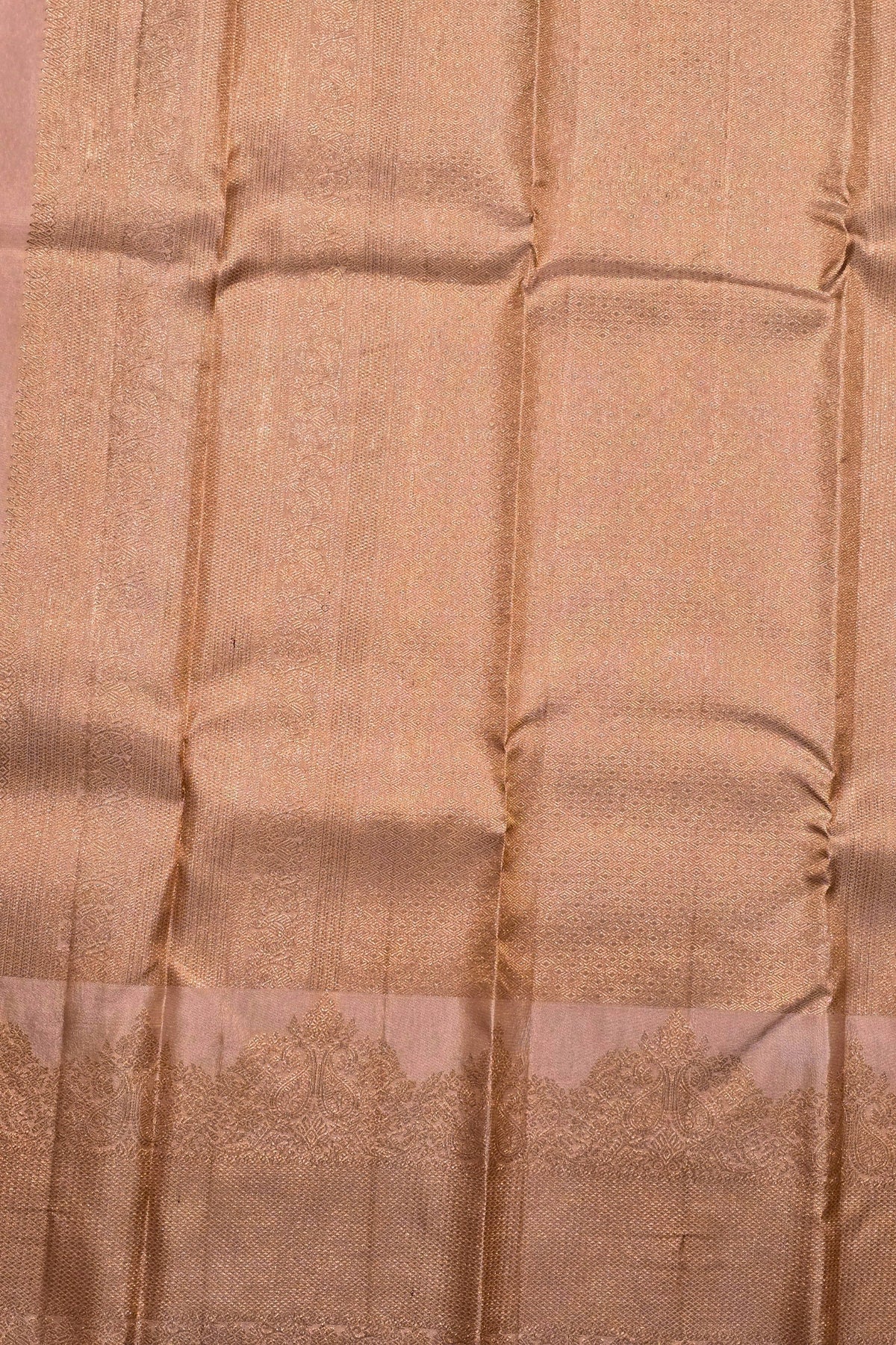 Close-up of brown fabric with a subtle pattern