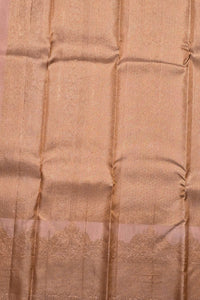 Close-up of brown fabric with a subtle pattern