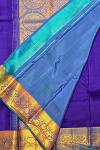 Blue and purple saree with gold border