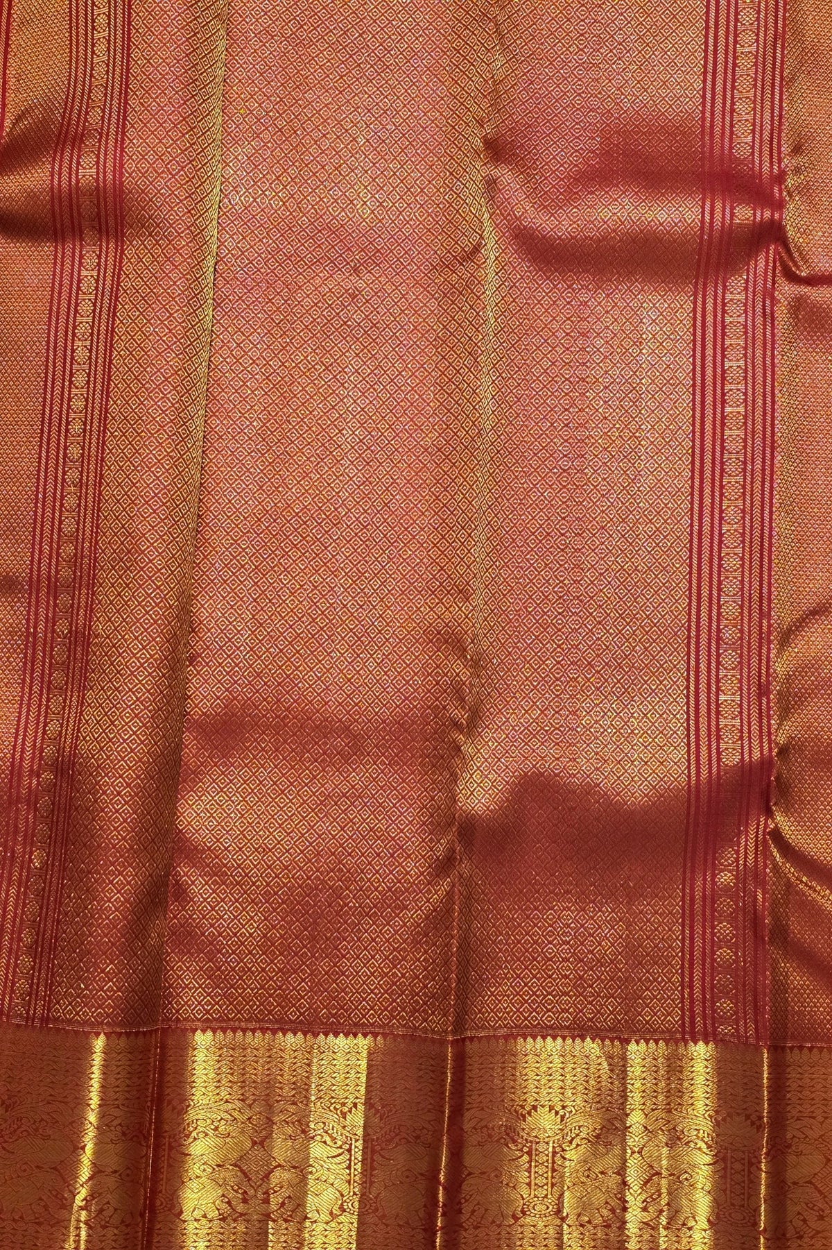 Rich Maroon Kanchipuram Silk Saree with Grand Gold Zari Detailing