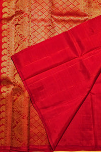 Red fabric with gold patterned border