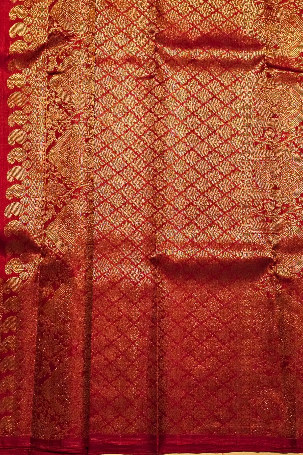 Red fabric with gold intricate patterns
