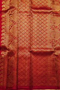 Red fabric with gold intricate patterns