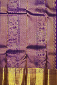 Purple and gold fabric with intricate patterns