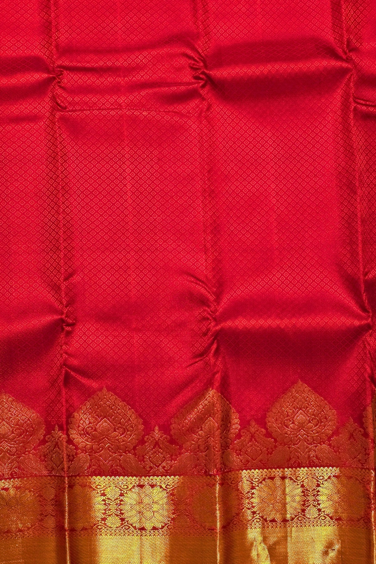 Red fabric with gold embroidery