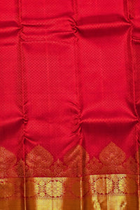 Red fabric with gold embroidery
