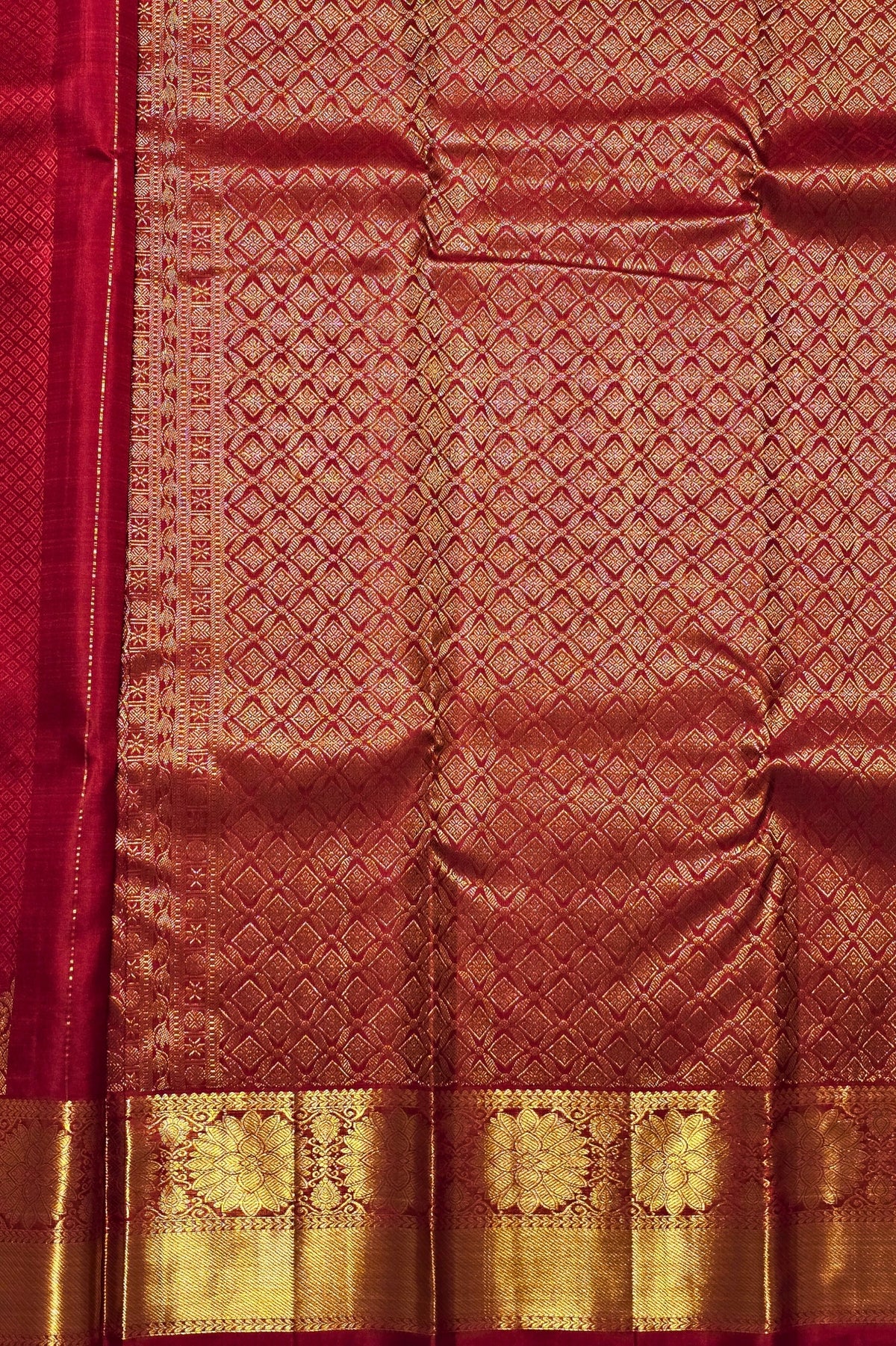 Red fabric with gold geometric pattern