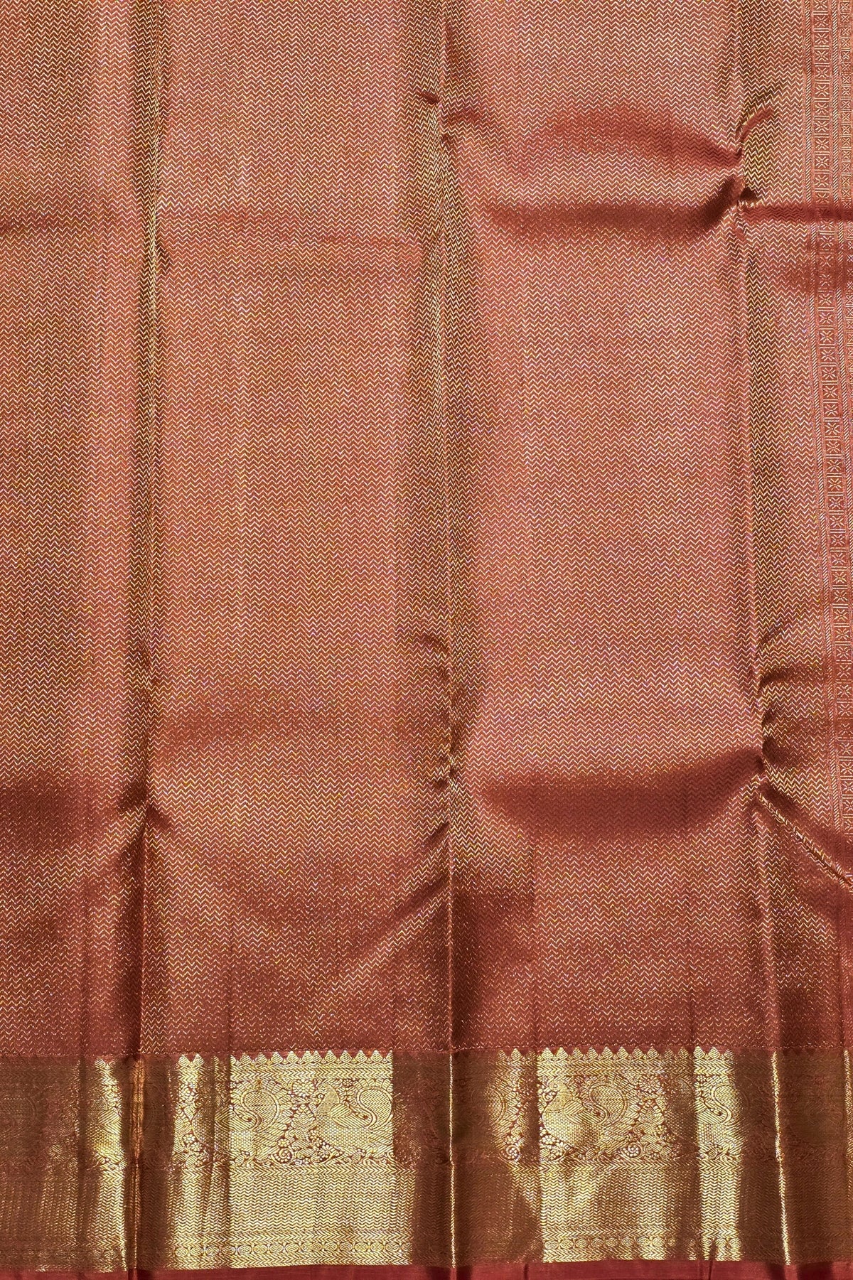 Brown fabric with a gold border