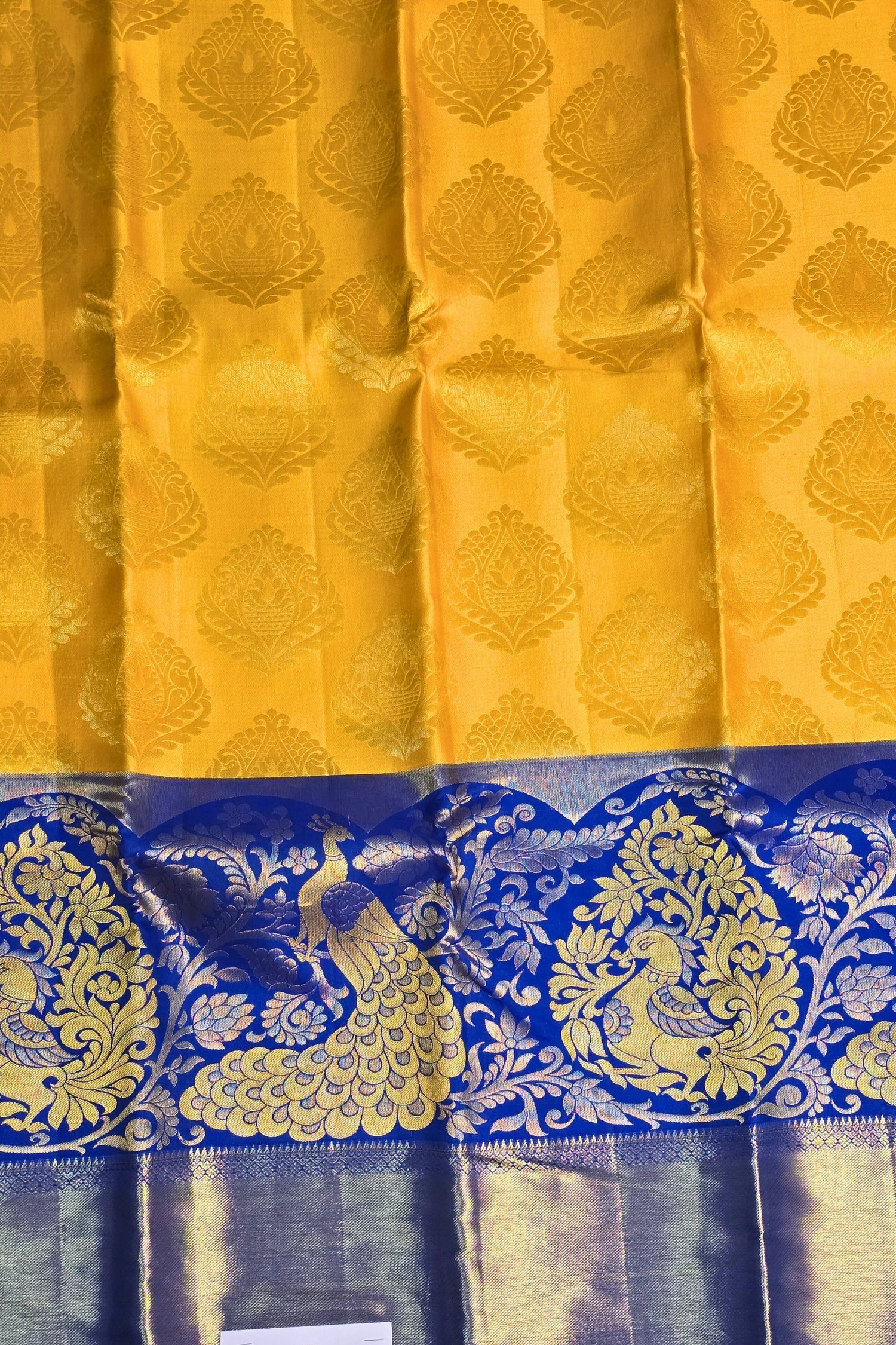 Radiant Yellow with Royal Blue Border Kanchipuram Silk Saree