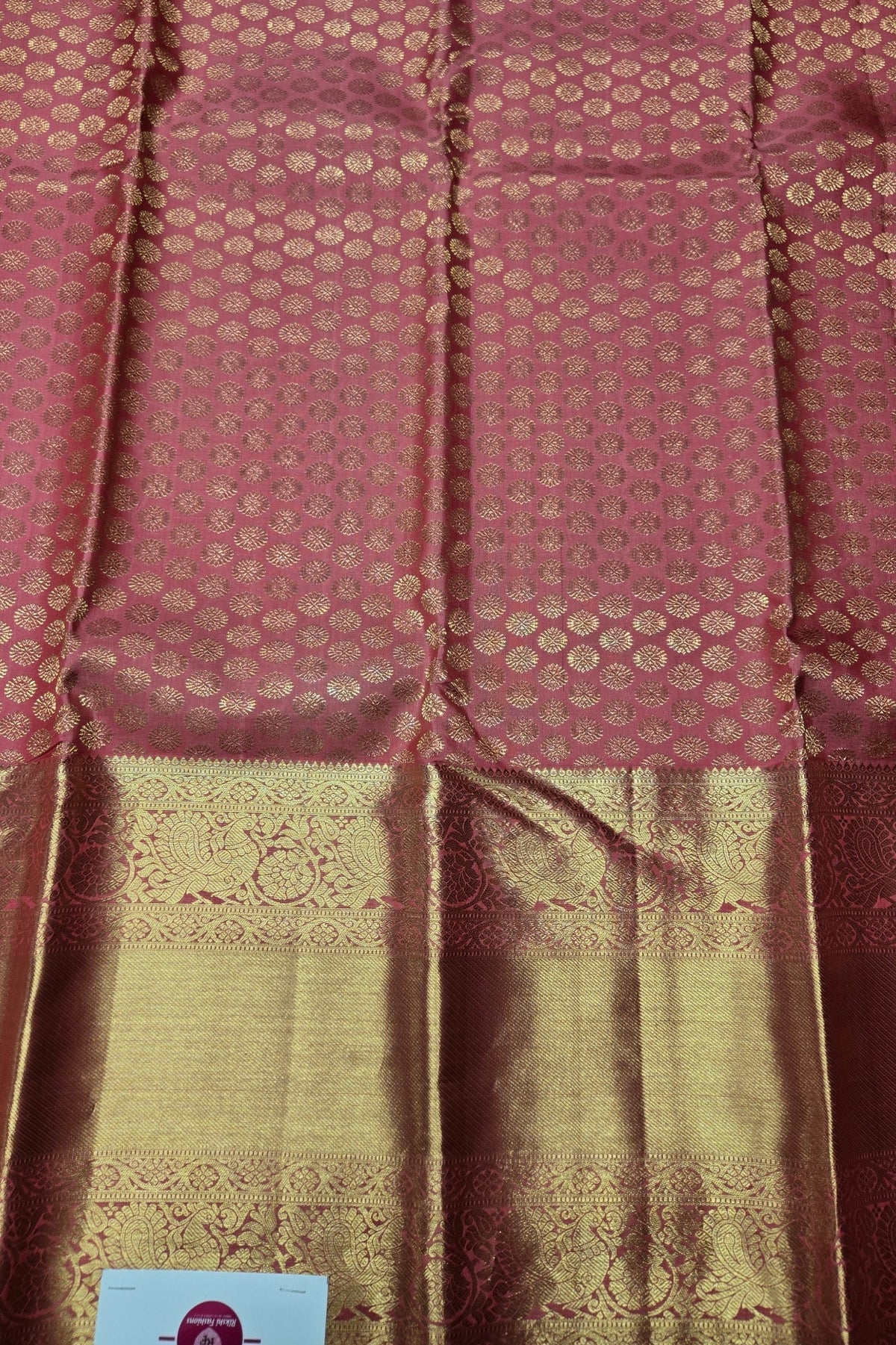 Patterned fabric with a gold and red design