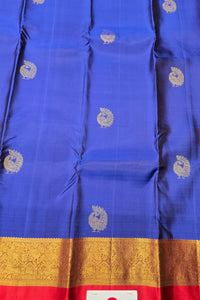 Blue fabric with gold and red border