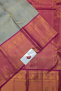 Saree with a pink and gray patterned design