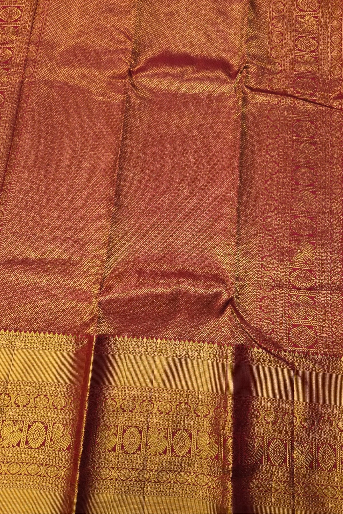 Close-up of a brown fabric with intricate patterns