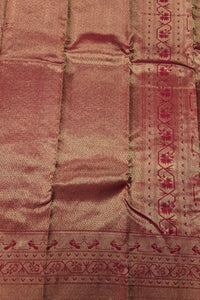 Close-up of a maroon fabric with intricate patterns