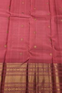 Pink saree with gold patterns